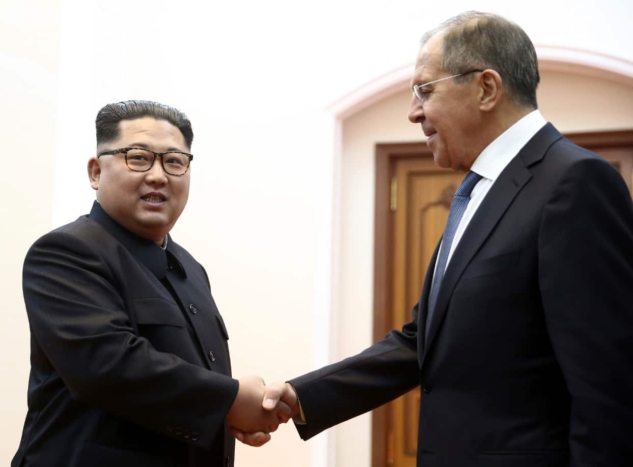Korean leader Kim Jong-un, left, and Russia's Foreign Minister Sergei Lavrov shake hands during a meeting in Pyongyang, North Korea.