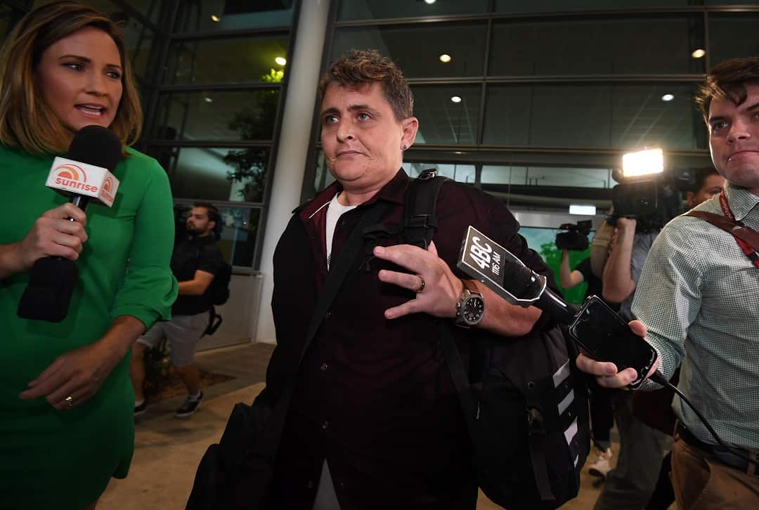 Bali Nine drug smuggler Renae Lawrence was pursued by reporters at Brisbane airport.