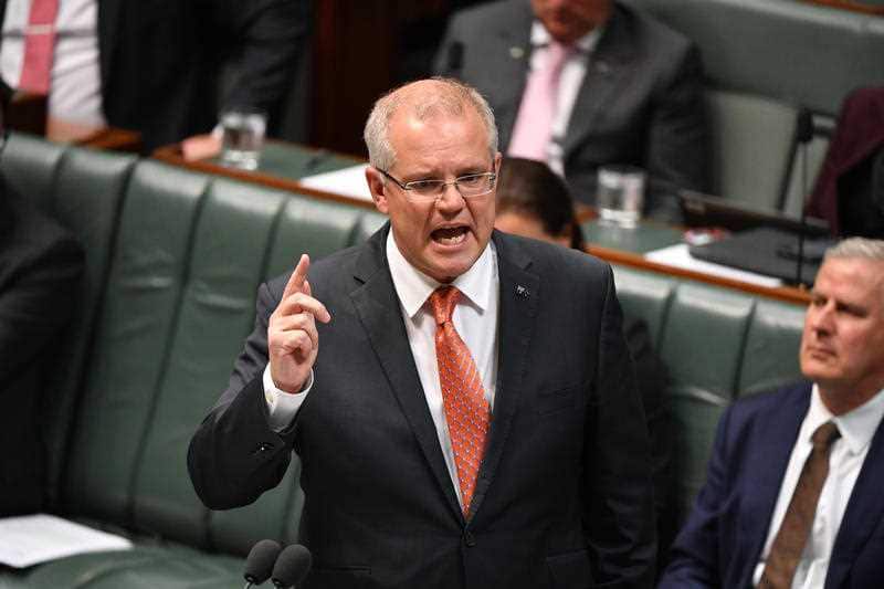 Prime Minister Scott Morrison has called on the crossbench to "pick and side" when it comes to pushing through the national security legislation.
