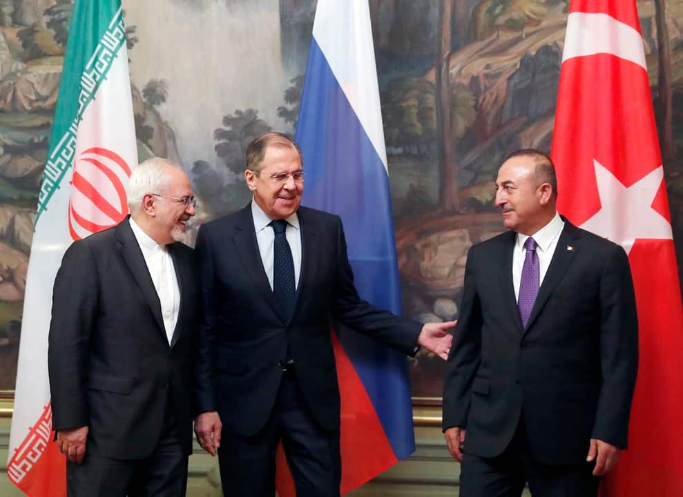 From left: Iranian Foreign Minister Mohammad Javad Zarif, Russian Foreign Minister Sergei Lavrov, and Turkish Foreign Minister Mevlut Cavusoglu.
