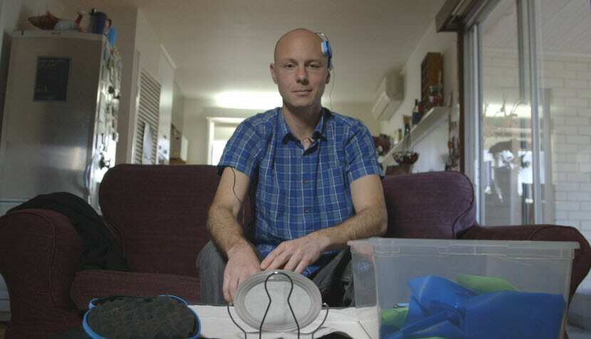 Leigh uses a brain stimulation device at home as alternative therapy to treat his bipolar and anxiety. (SBS)