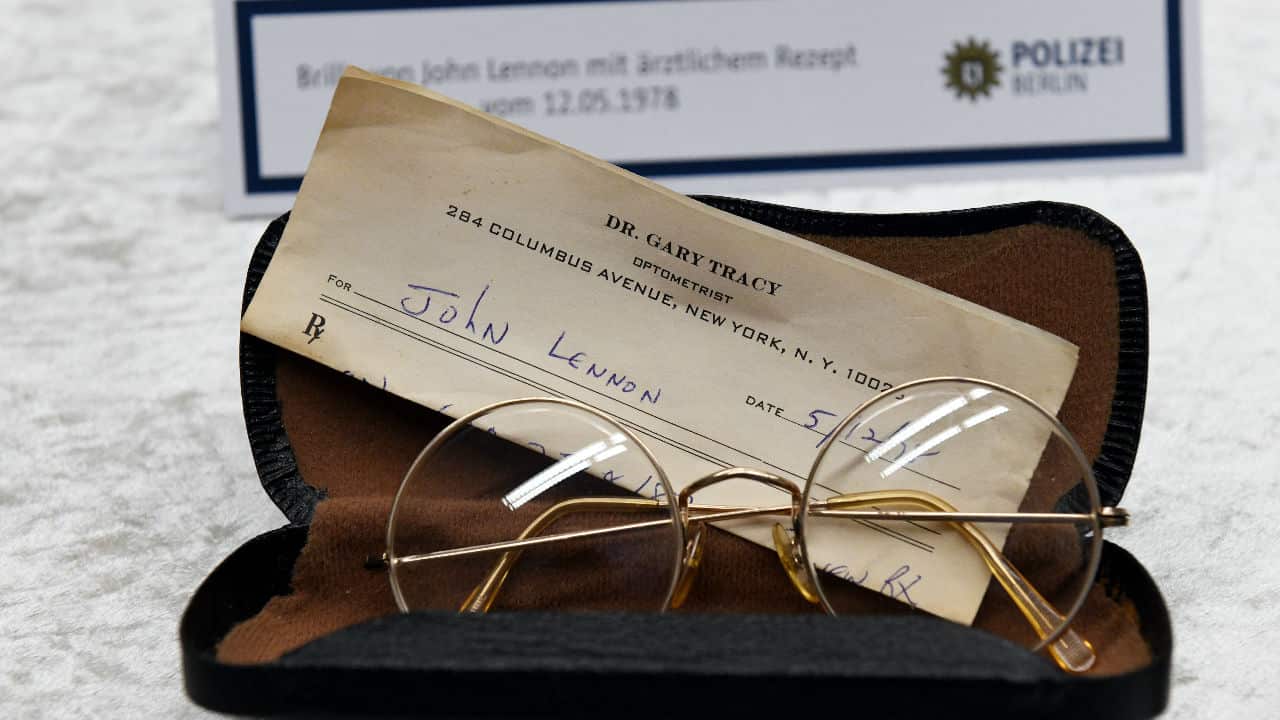 Stolen glasses belonging to the Beatles musician John Lennon on display at a press conference.