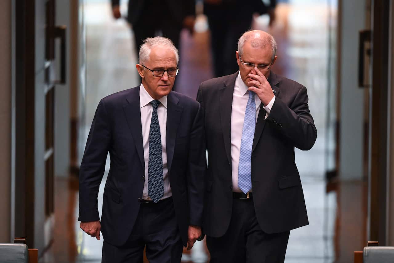 Then-Australian Prime Minister Malcolm Turnbull (left) and then-Australian Treasurer Scott Morrison in 2018, before Mr Turnbull was rolled. 