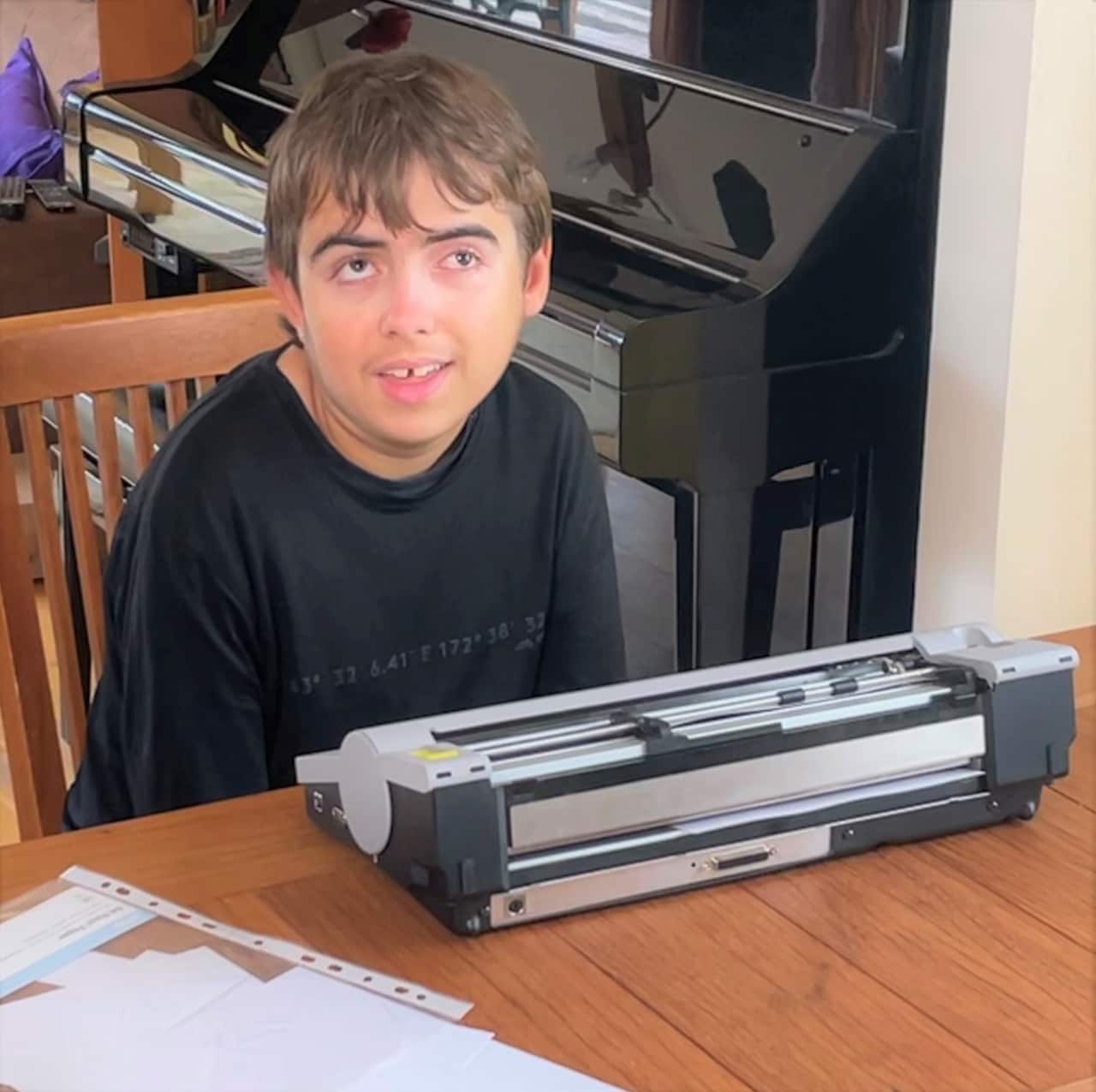 Luca Weber at his braille machine. 