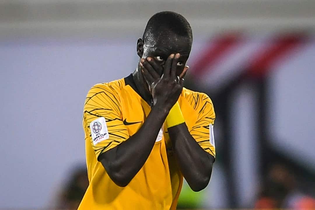 Awer Mabil celebrates after scoring a goal against Syria in their AFC Asian Cup. 