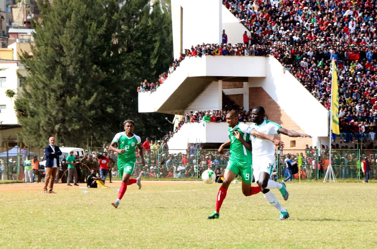 Senegal Kalidou Koulibaly (R) and Madagascar captain Andriatsima Fanev Ima (L) vie for the ball during their Africa Cup of Nations 2019 qualifier on September 9