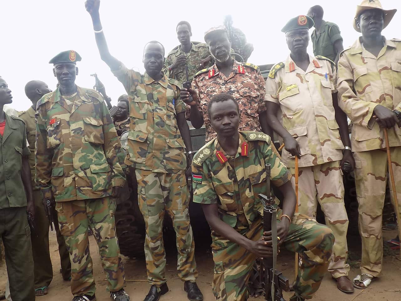 Sydney man Makuer Mabor (kneeling) - Facebook