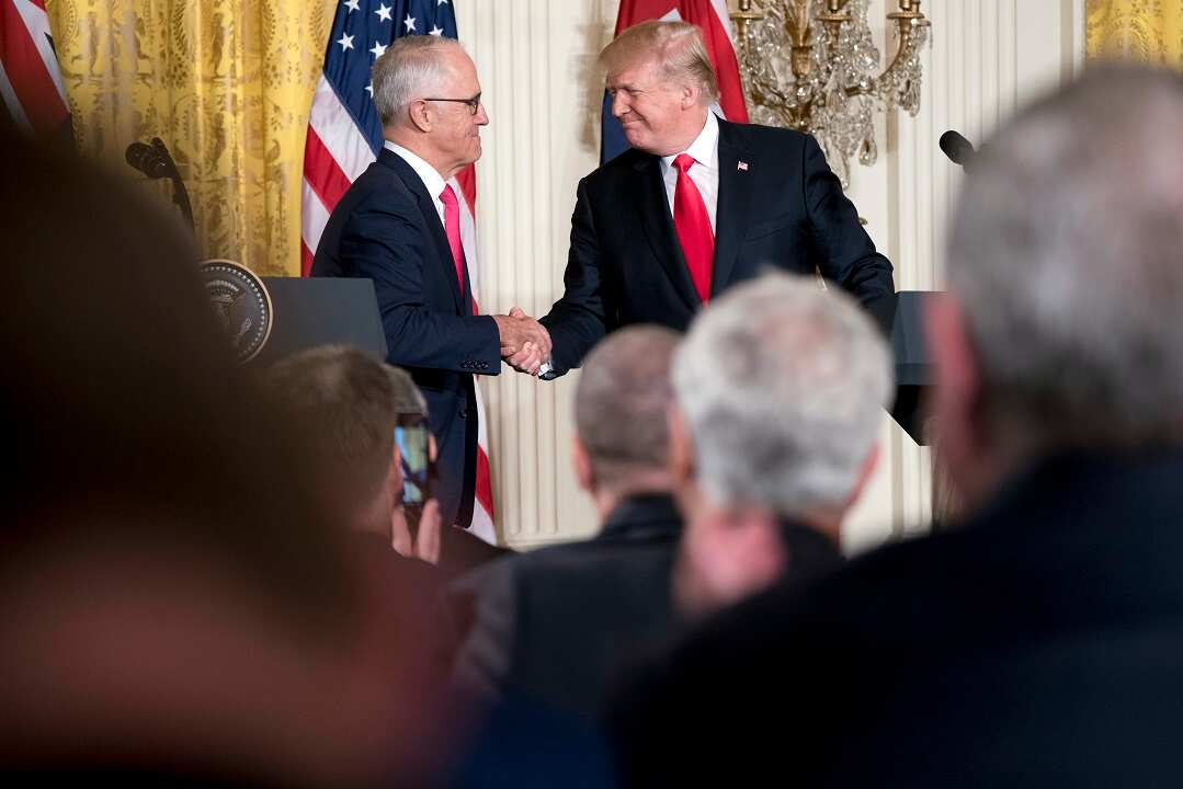 President Donald Trump and Australian Prime Minister Malcolm Turnbull shake hands during a news conference in the East Room of the White House in Washington, Friday, Feb. 23, 2018. (AP Photo/Andrew Harnik)