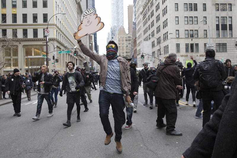 Demonstrators take to the street on during an anti Donald Trump protest, Saturday, March 19, 2016, in New York. (AAP)