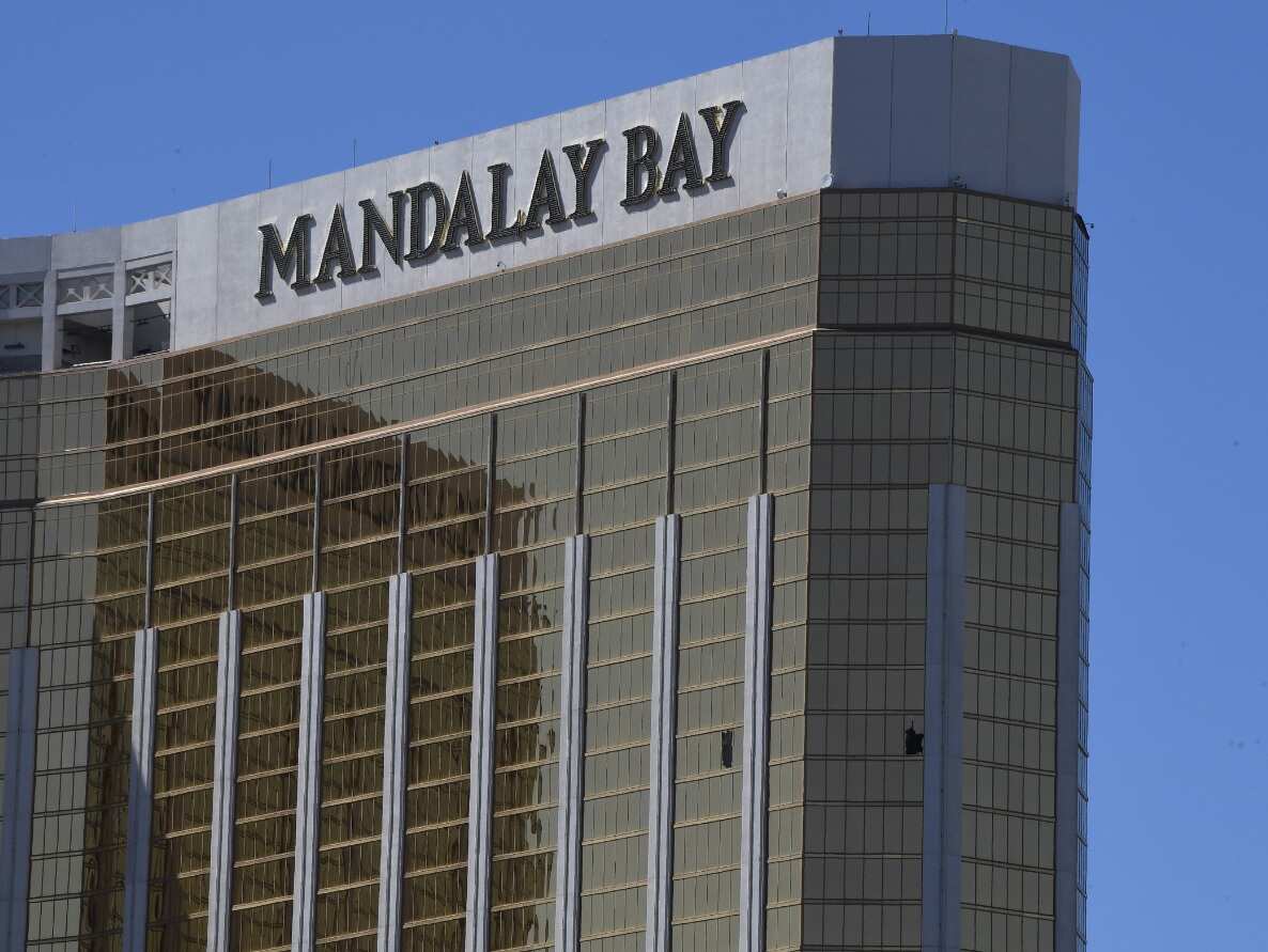 Broken windows are seen on the 32nd floor of the Mandalay Bay Resort and Casino after a lone gunman opened fired on the Route 91 Harvest country music festival