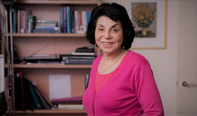 Dr Manjula O’Connor standing in an office.