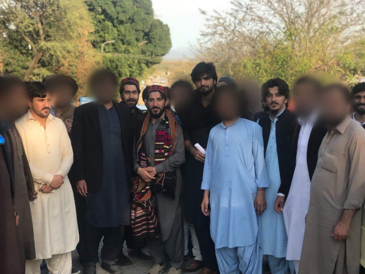 PTM leader Manzoor Pashteen (centre) with Kashef Khan (right of Pashteen) and other PTM members