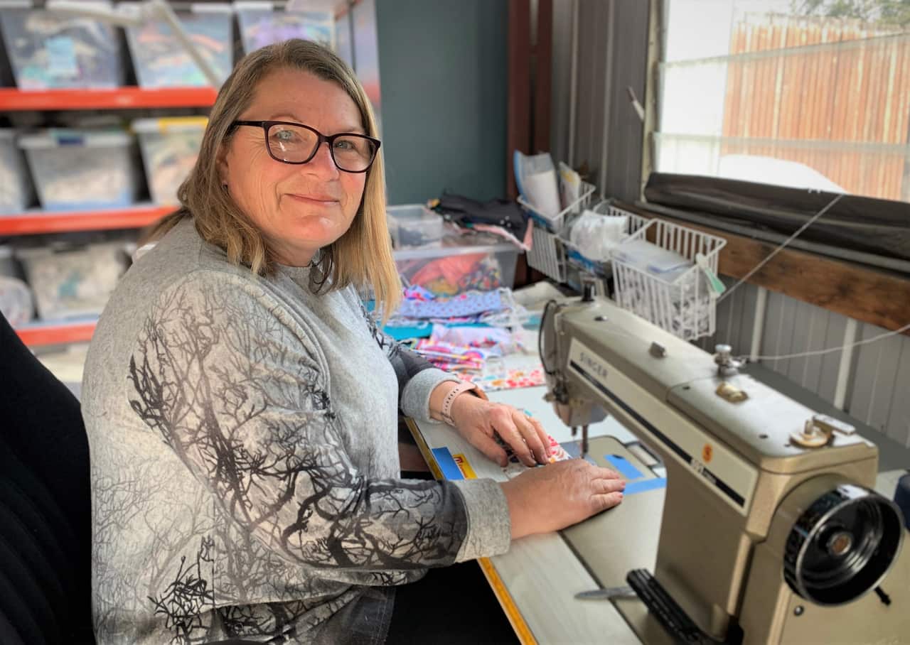 Marianne Buckley makes masks at home in Melbourne.