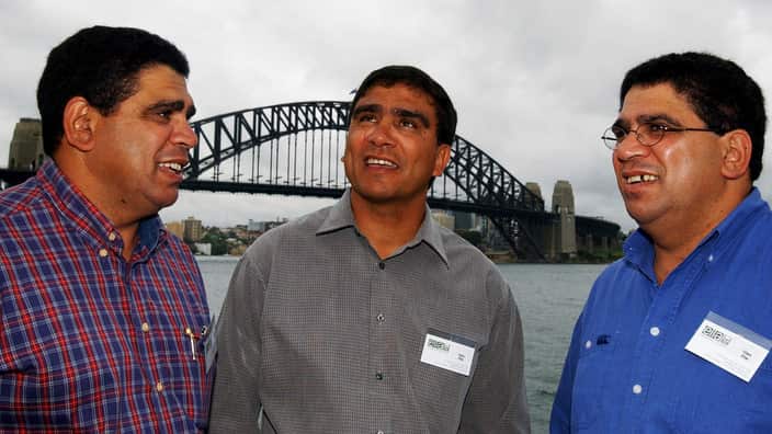 The Ella brothers from Left Mark, Glen and Gary on the Harbour foreshore launching their new firm Ella Management and Events Pty Ltd. (AAP Image/Laura Friezer) NO ARCHIVING