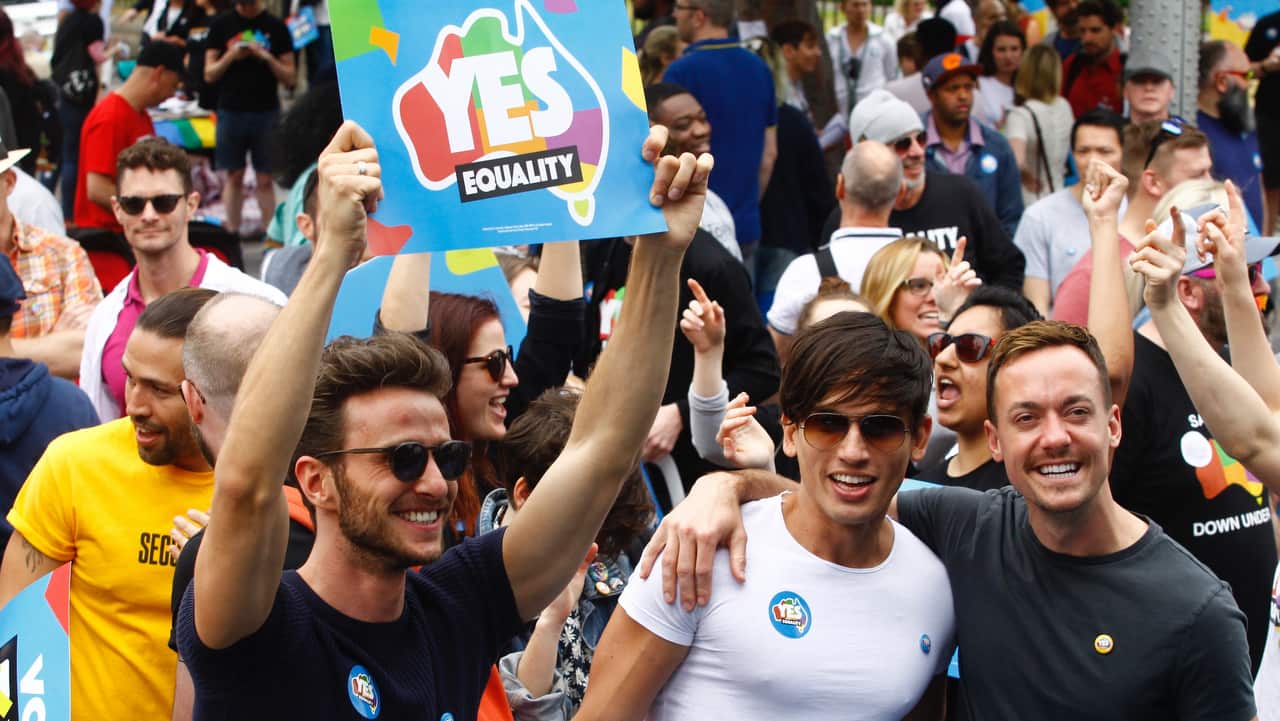 Supporters of marriage equality are seen at the Post Your Yes Vote Street Party at Taylor Square in Darlinghurst, Sydney on October 8.
