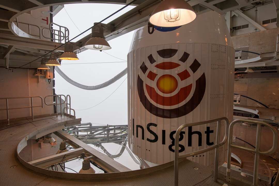 In this image released by NASA, a United Launch Alliance (ULA) Atlas-V rocket with NASA's InSight onboard awaits launch, Friday, May 4, 2018, at Vandenberg Air Force Base, Calif. The rocket is set to launch early Saturday. (Bill Ingalls/NASA via AP)