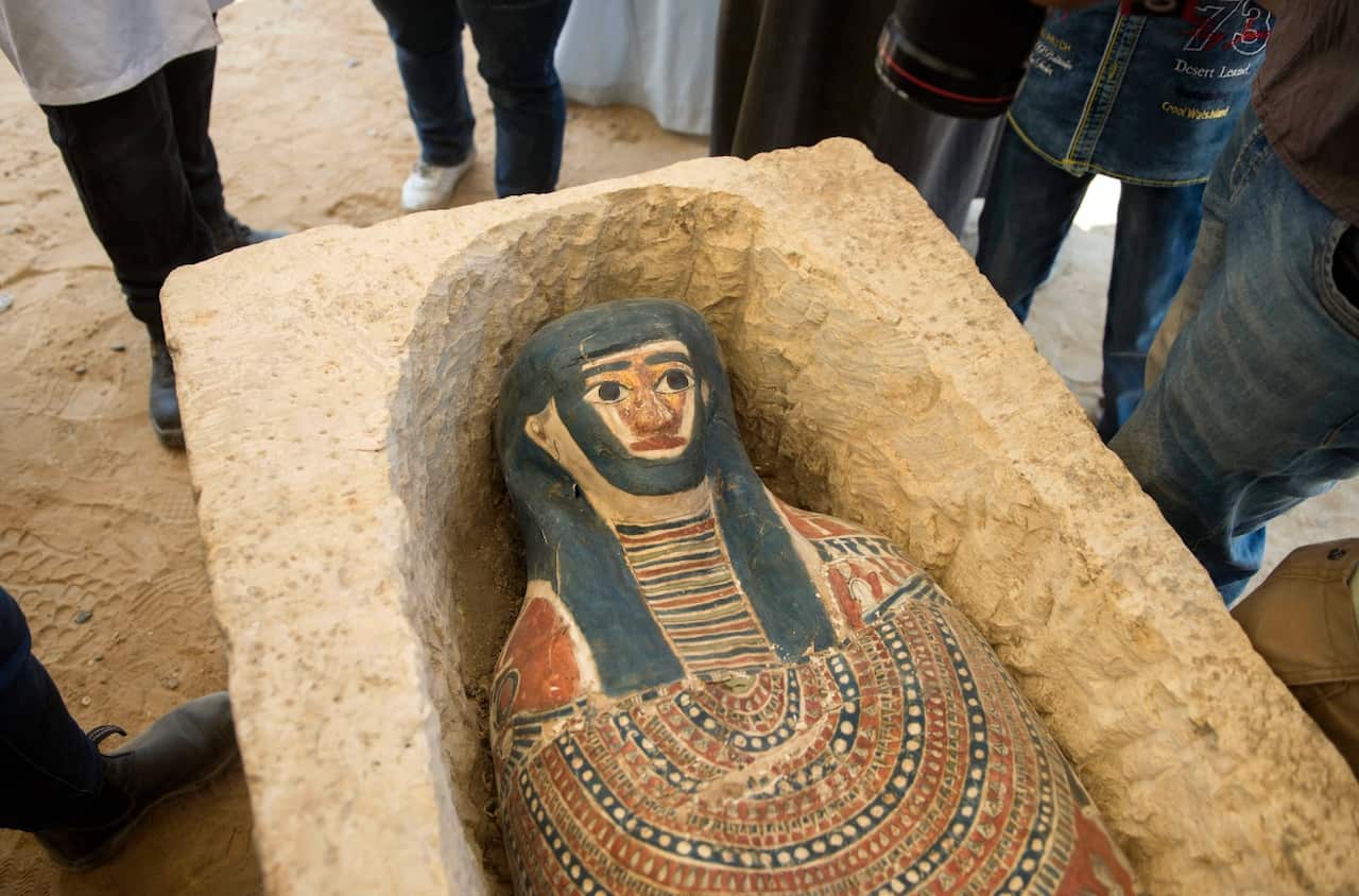 Archeologists display a sarcophagus that was discovered during archaeological excavation almost 300 meters south of King Amenemhat II pyramid at Dahshur 