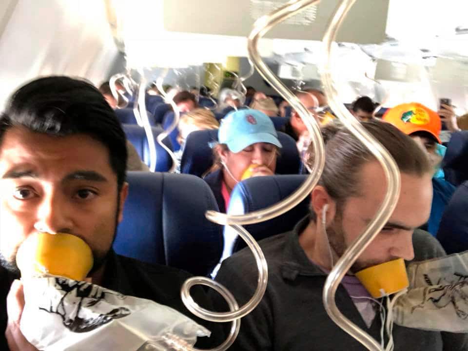 April 17, 2018: Terrified passengers on board the Southwest Airlines Boeing 737. 
