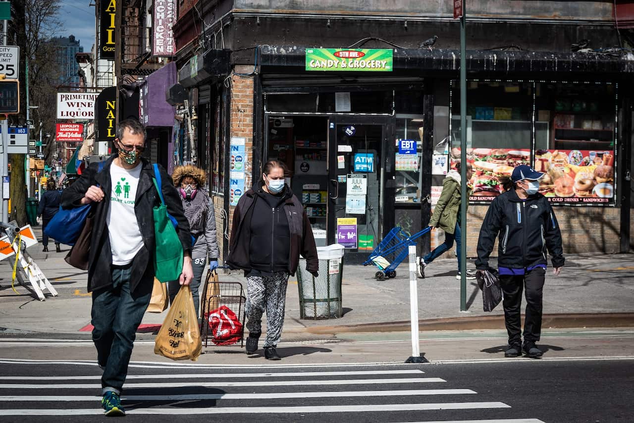 New Yorkers wear face masks in an effort to protect themselves from the potentially deadly virus.