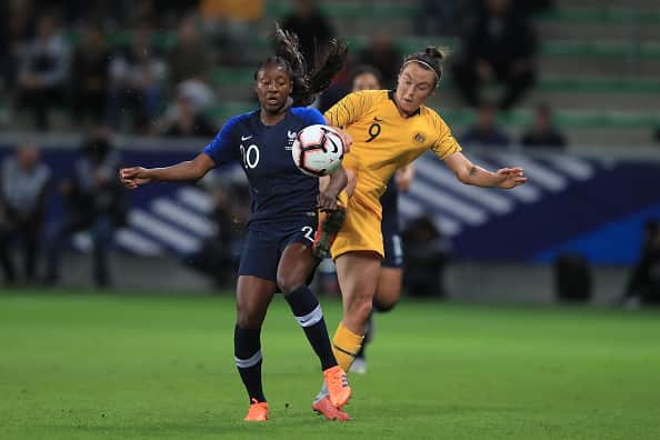 Caitlin Foord of Australia in action with Kadidiatou Diani of France.