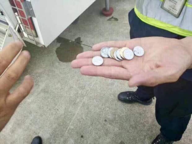 The elderly passenger threw nine coins into the plane engine