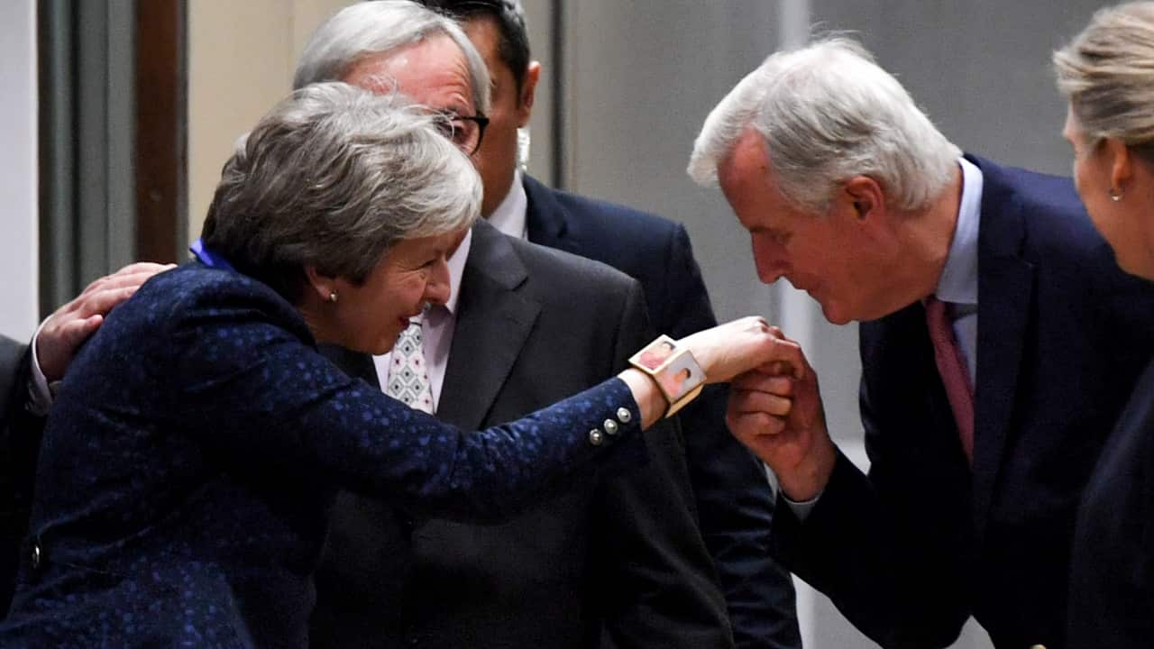 British Prime Minister Theresa May, European commission President Jean-Claude Juncker and Michel Barnier, the European Chief Negotiator for Brexit.