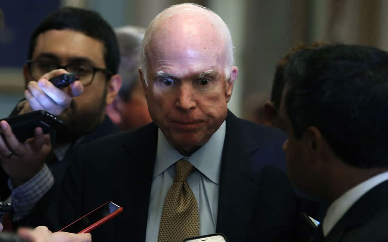 John McCain speaks to reporters after attending the Senate GOP policy luncheon on Capitol Hill, October 31, 2017 in Washington, DC.