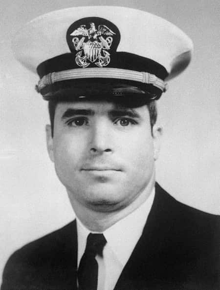 A young Lt. Commander John McCain. The president has previously referred to the veteran as a "loser" for being captured during the Vietnam conflict.