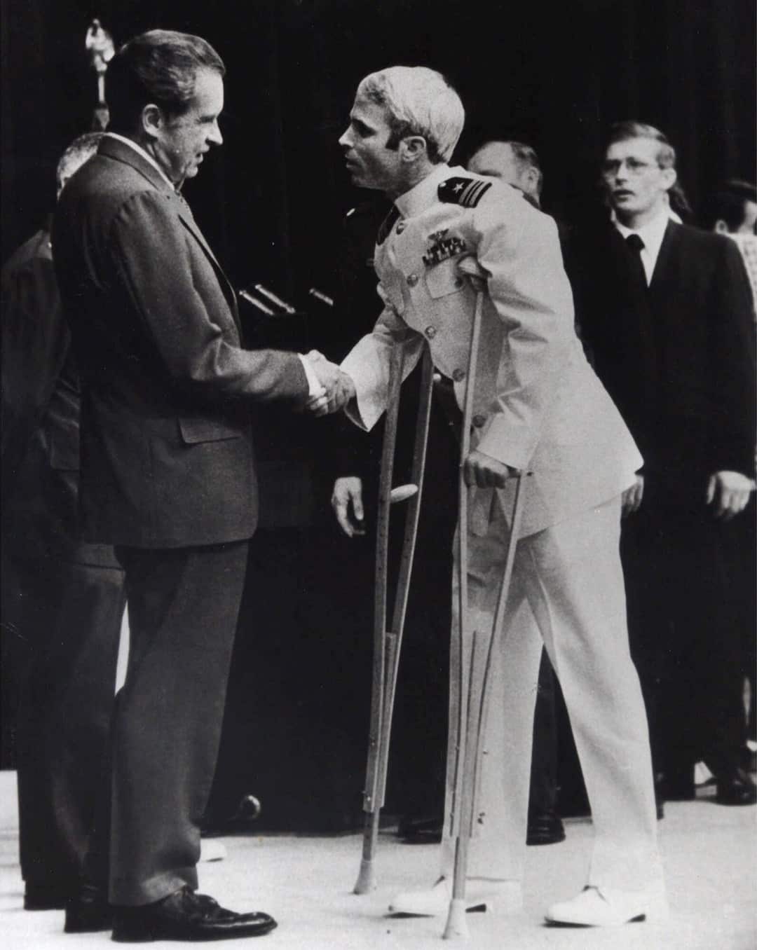 John McCain is greeted by President Richard Nixon 1973 after he spending more than five years in a Vietnamese prisoner of war camp.