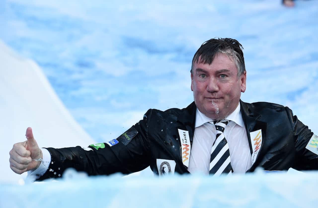 Collingwood president Eddie McGuire takes part in the Big Freeze Ice Slide challenge fundraising event for Motor Neurone Disease (AAP)