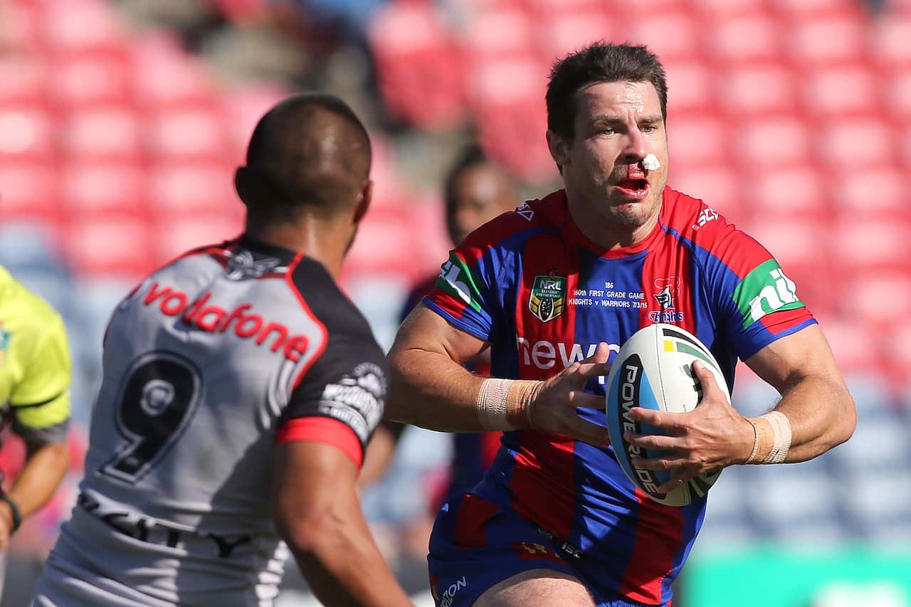 NRL Rd 1 - Knights v Warriors James McManus carries the ball