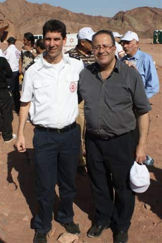 A medic from MDA with Dr Mohammed Al-Hadid