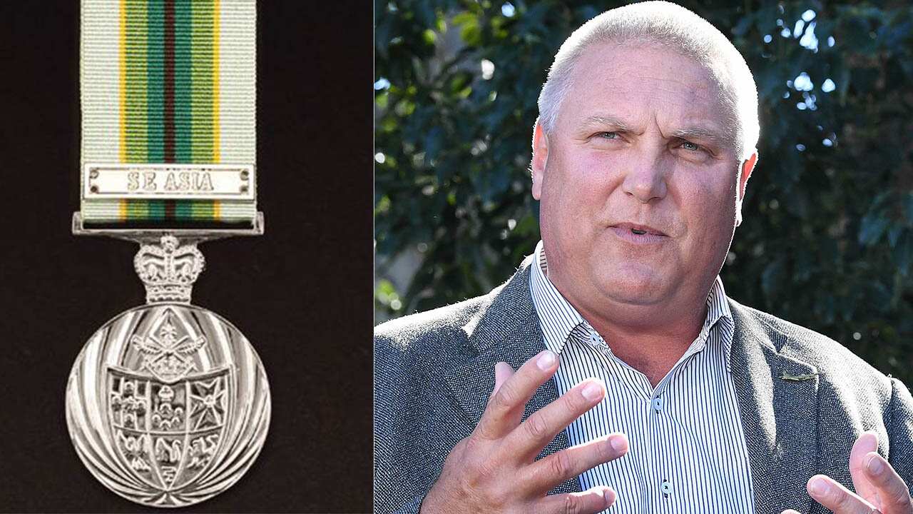 Trevor Ruthenberg says he accidentally listed the Australian Service Medal (left) on his list of achievements. 