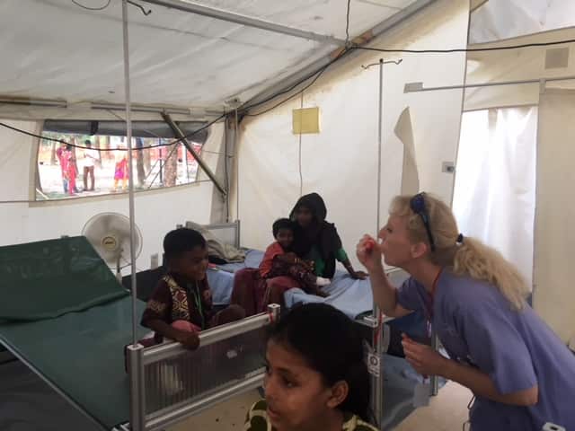 Medical staff blow bubbles to cheer up kids in the children’s ward.