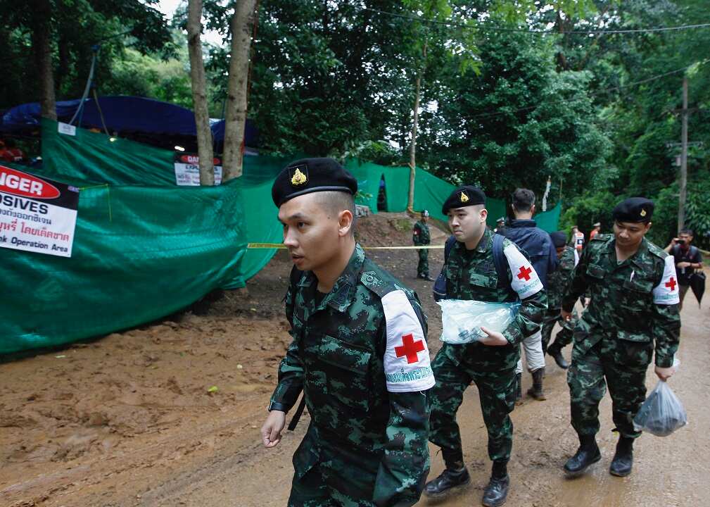 Thai military medical personnel move in.
