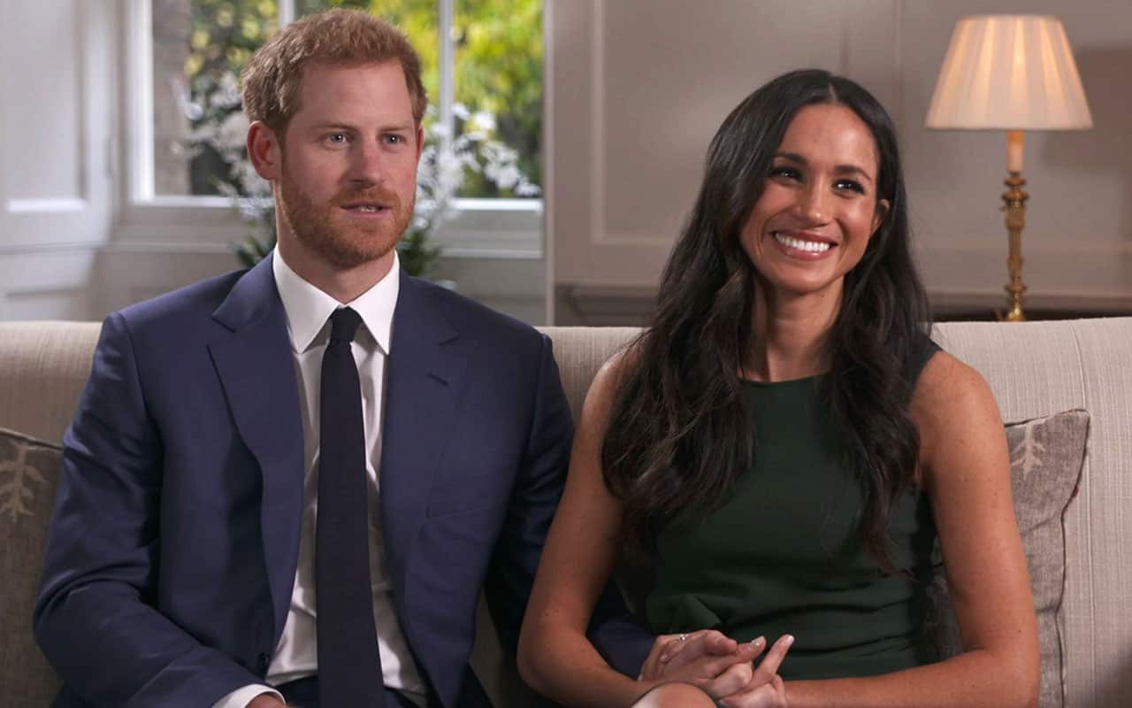 Britain's Prince Harry and Meghan Markle talk about their engagement during an interview in London.