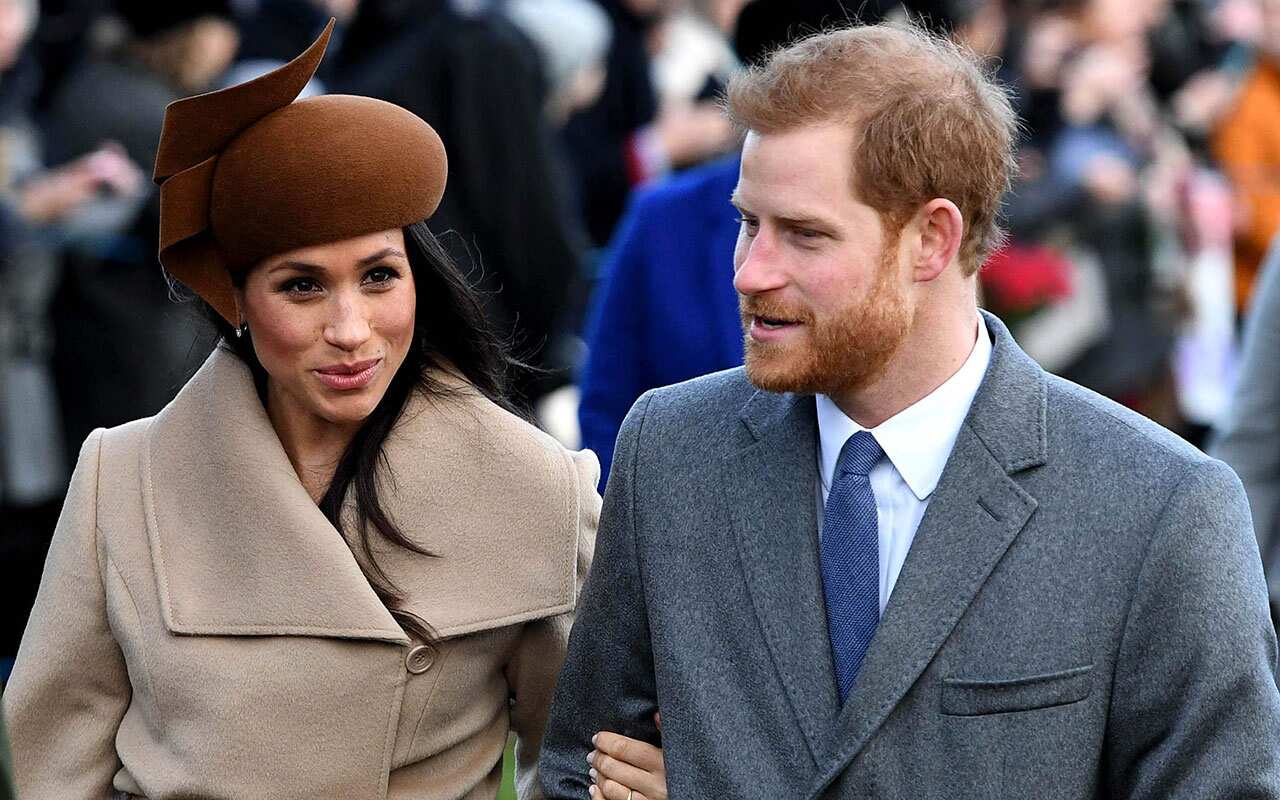 Prince Harry and his fiancee Meghan Markle arrive to attend the traditional Christmas Day service.