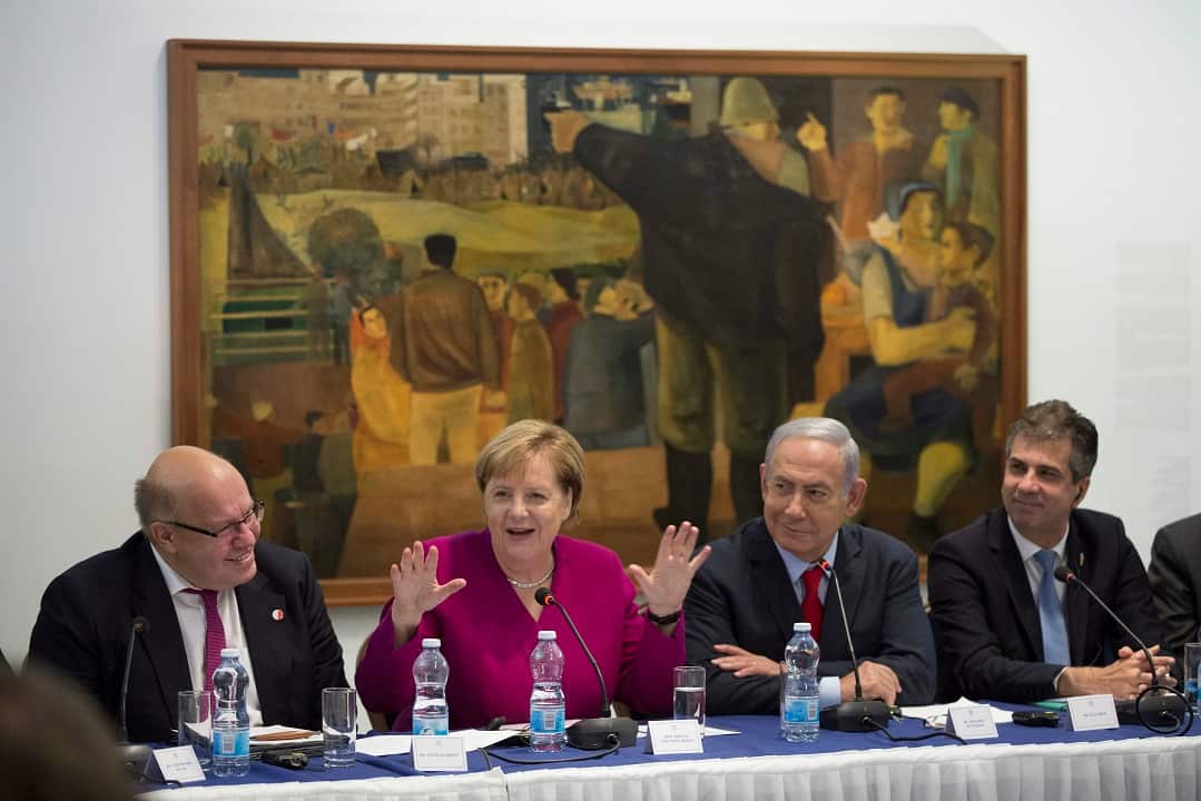 Israeli Prime Minister Benjamin Netanyahu (centre, right) and German Chancellor Angela Merkel.
