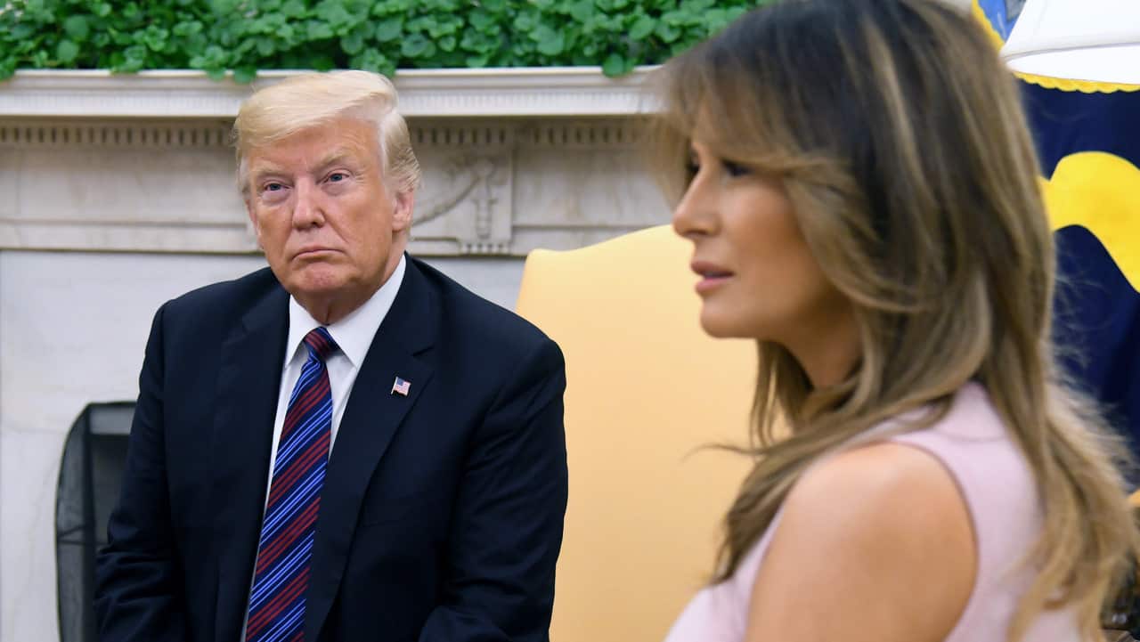 US President Donald Trump and First Lady Melania Trump in the Oval Office of the White House.