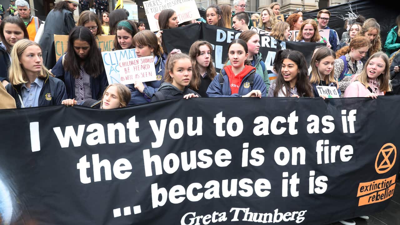 Students gathered in front of Melbourne's state parliament before marching through the city.