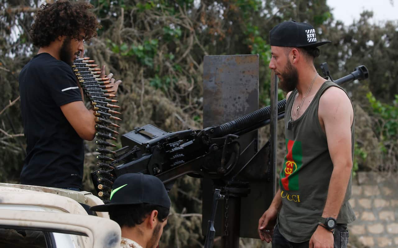 Tripoli government forces reload during clashes, south of the capital Tripoli. Libya has been mired in chaos since 2011.