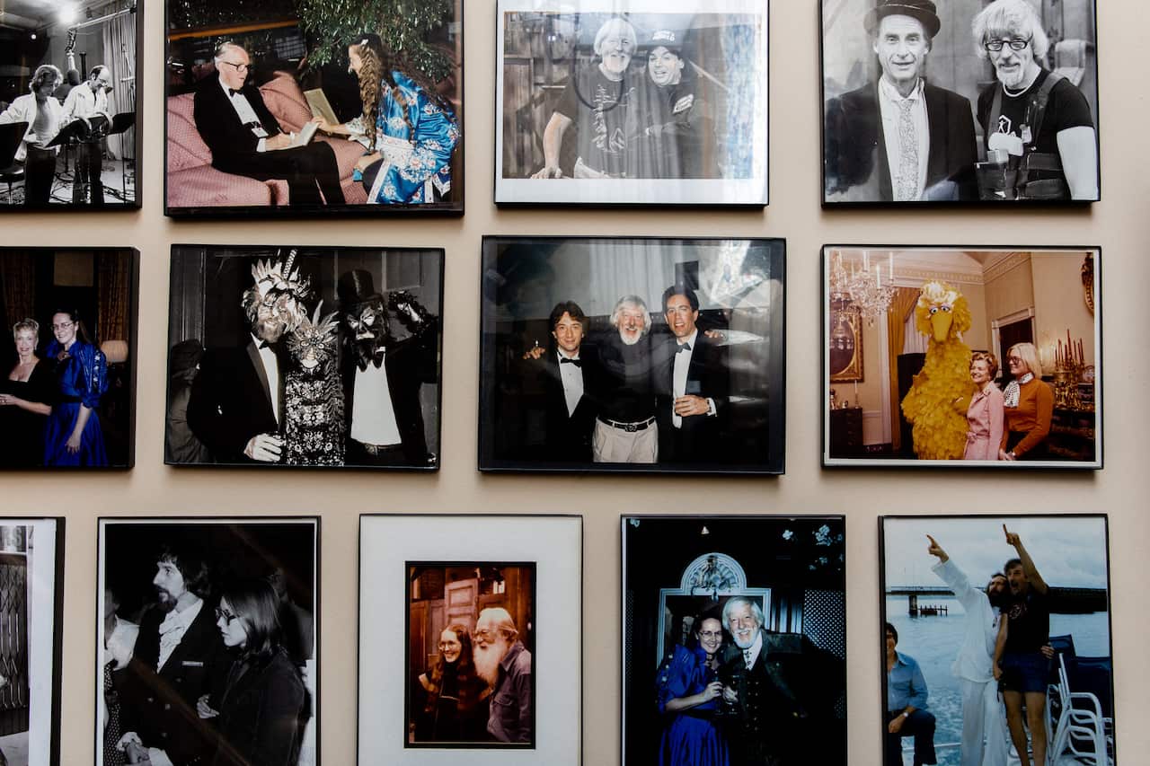 Photographs in Spinney's home include shots of him with celebrities like Sid Caesar and Jerry Seinfeld.
