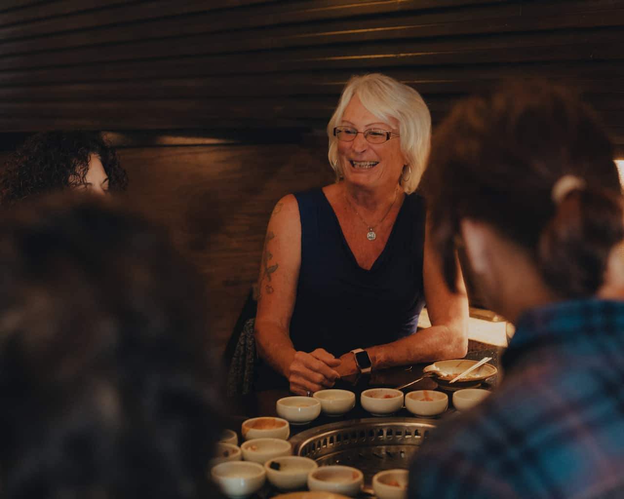 Lindsie Carlsen and other members of the group at a Korean barbecue restaurant in Los Angeles