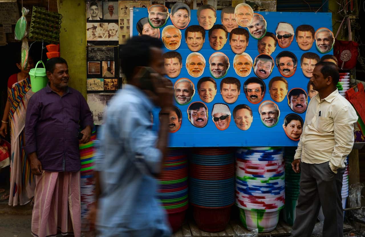India is gearing up for the world’s biggest election, with as many as 879 million eligible voters set to cast ballots starting on April 11. In Chennai, a shopkeeper displayed masks for political candidates.