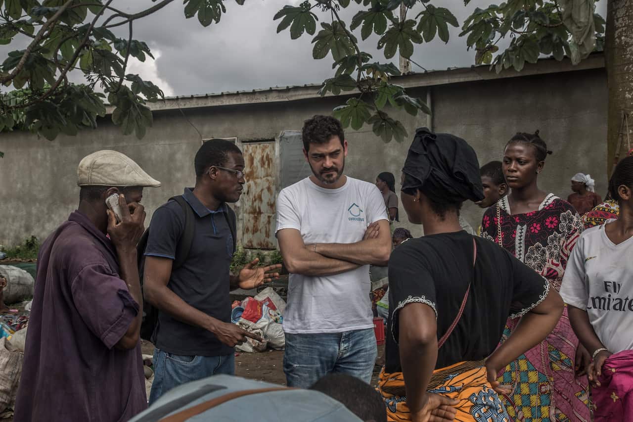 Oscar Méndez, center, is building a factory in West Africa that will manufacture bricks from recycled plastic.