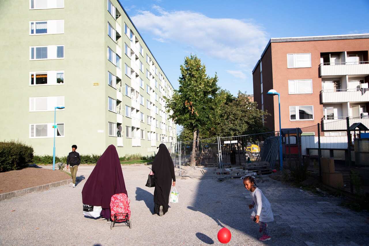 A Somali family walking home from Rinkeby Square. More than 91 percent of Rinkeby’s roughly 16,400 residents are immigrants and their children