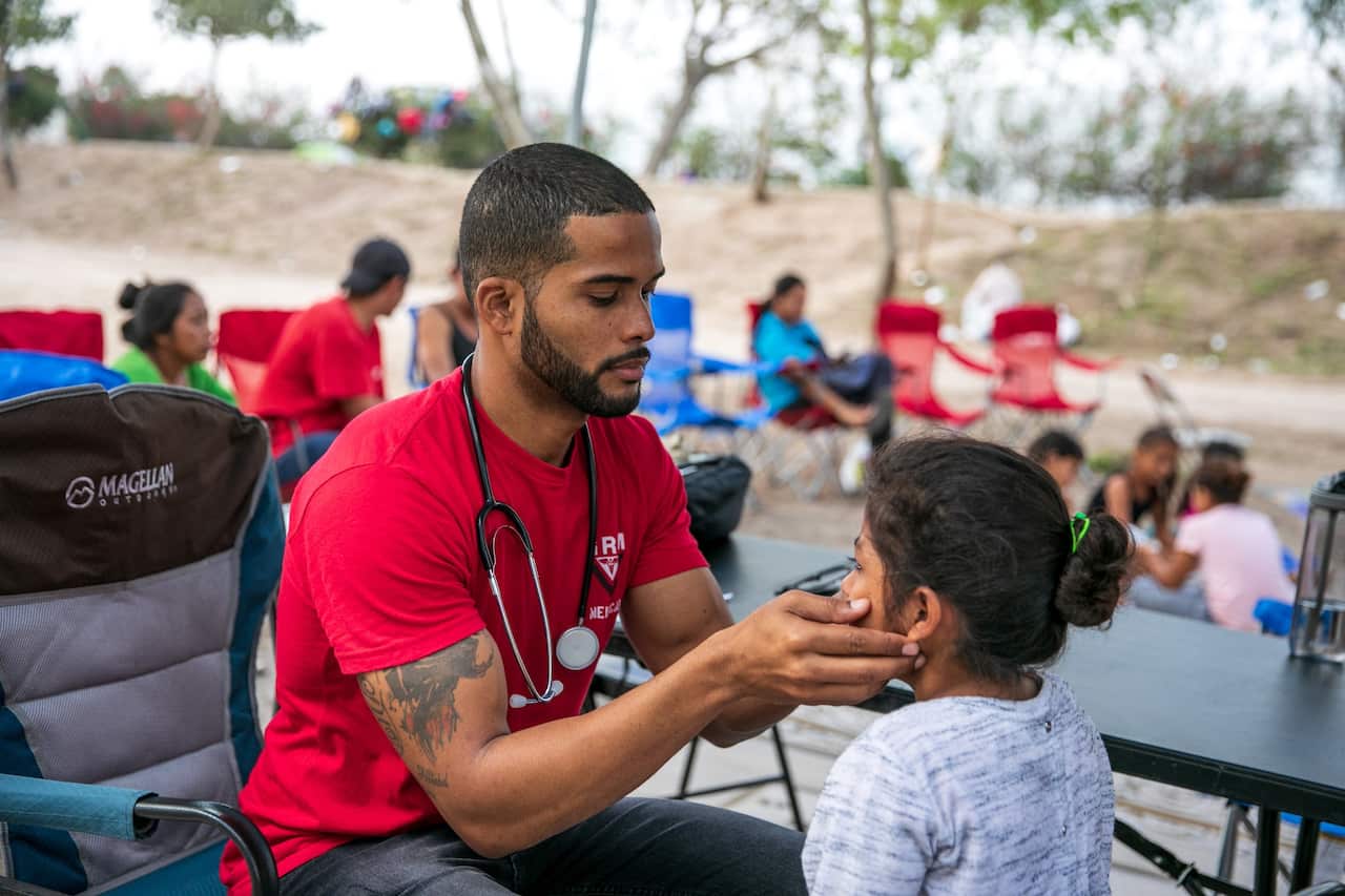 Dr Elisondo treated Estephanie, 4, for asthma at the camp.