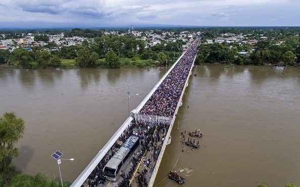 The Honduran migrant caravan heading to the US, as it is stopped at the Guatemala-Mexico international bridge in Ciudad Hidalgo, Mexico.