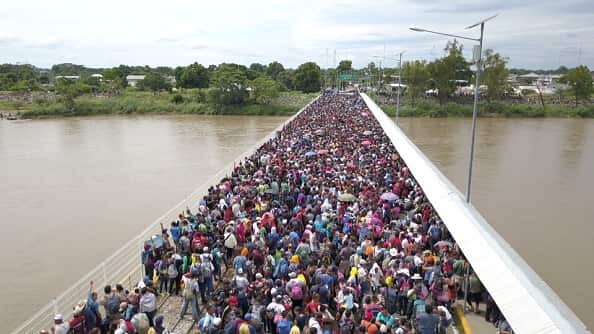 Thousands of migrants from Honduras are waiting on the border between Guatemala and Mexico. 