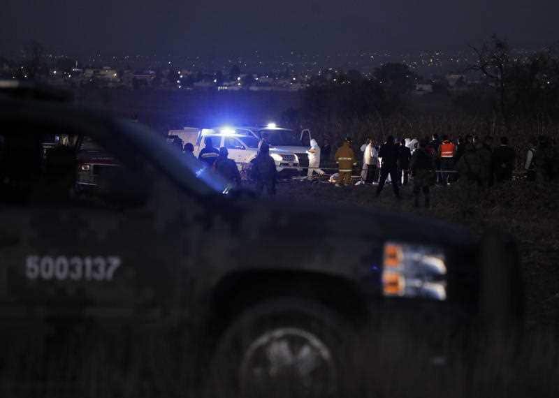 Emergency services at the scene of the helicopter crash.